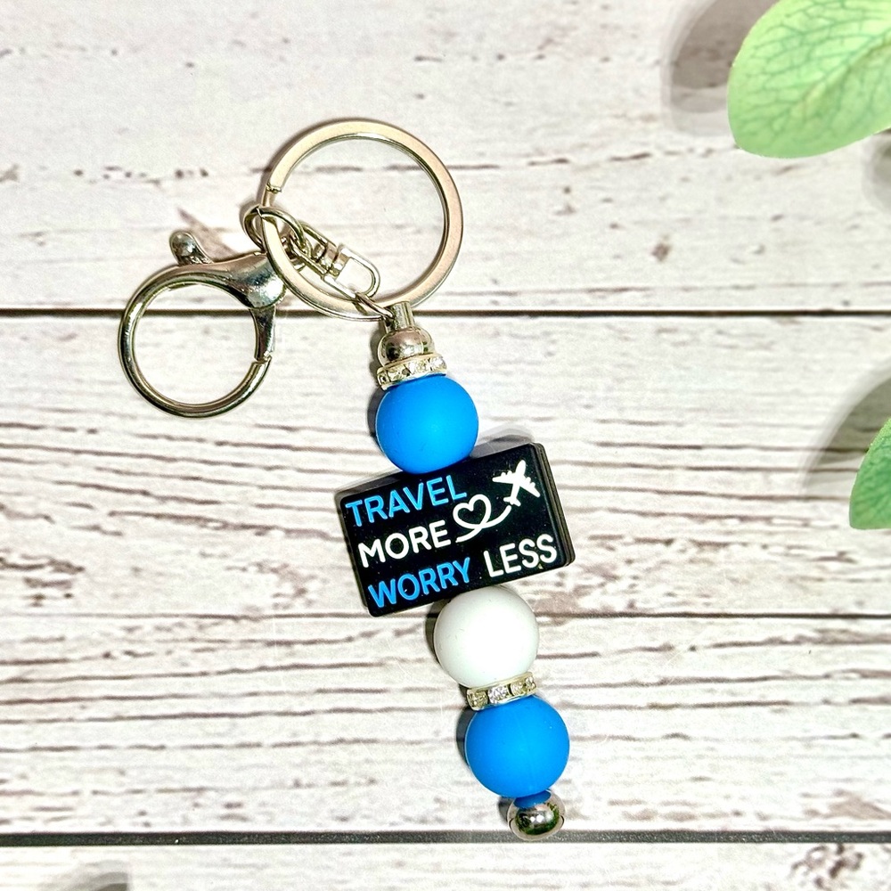Travel More, Worry Less Keychain